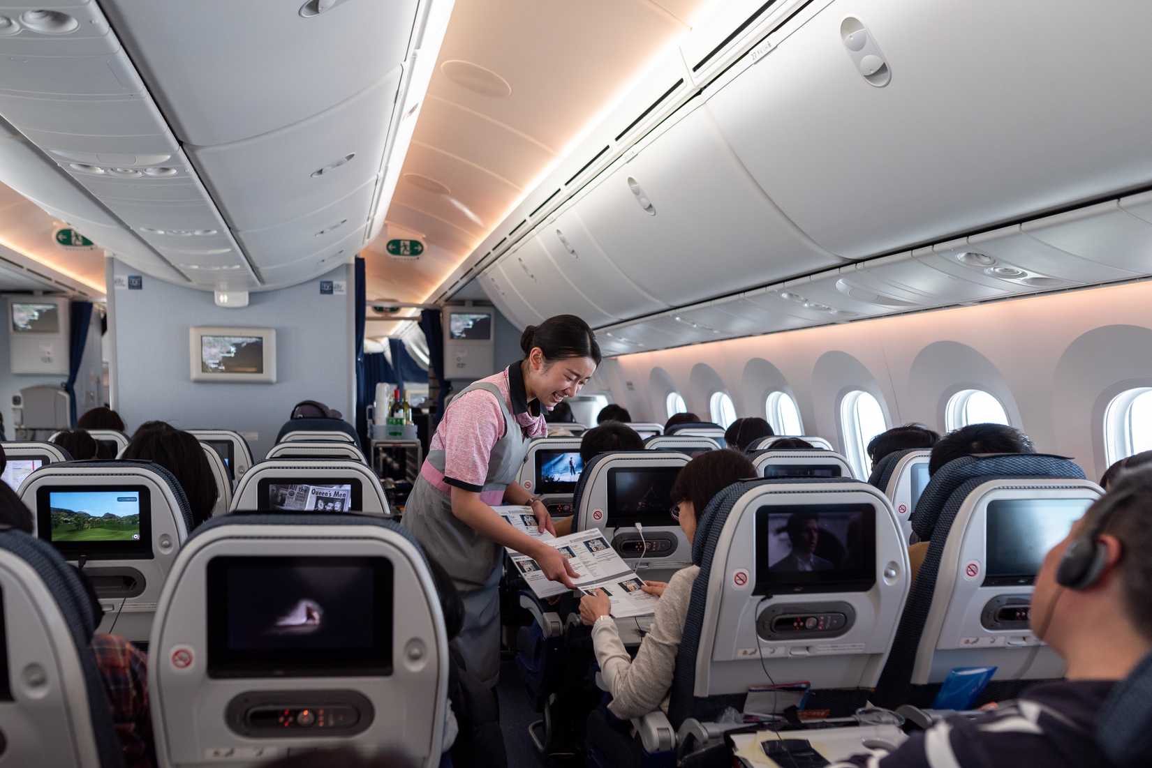 Boeing 787 Dreamliner passengers in cabin seats