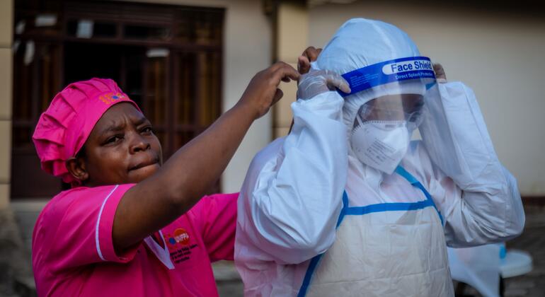 A displaced person in a camp awaiting burial of suspected Ebola victims in eastern Congo.