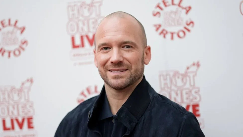 Palmer and Evans together, reflecting their ongoing television and podcast appearances