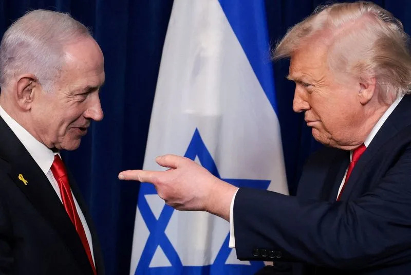 Trump in the Oval Office setting discussing Iran strategy with his national security team