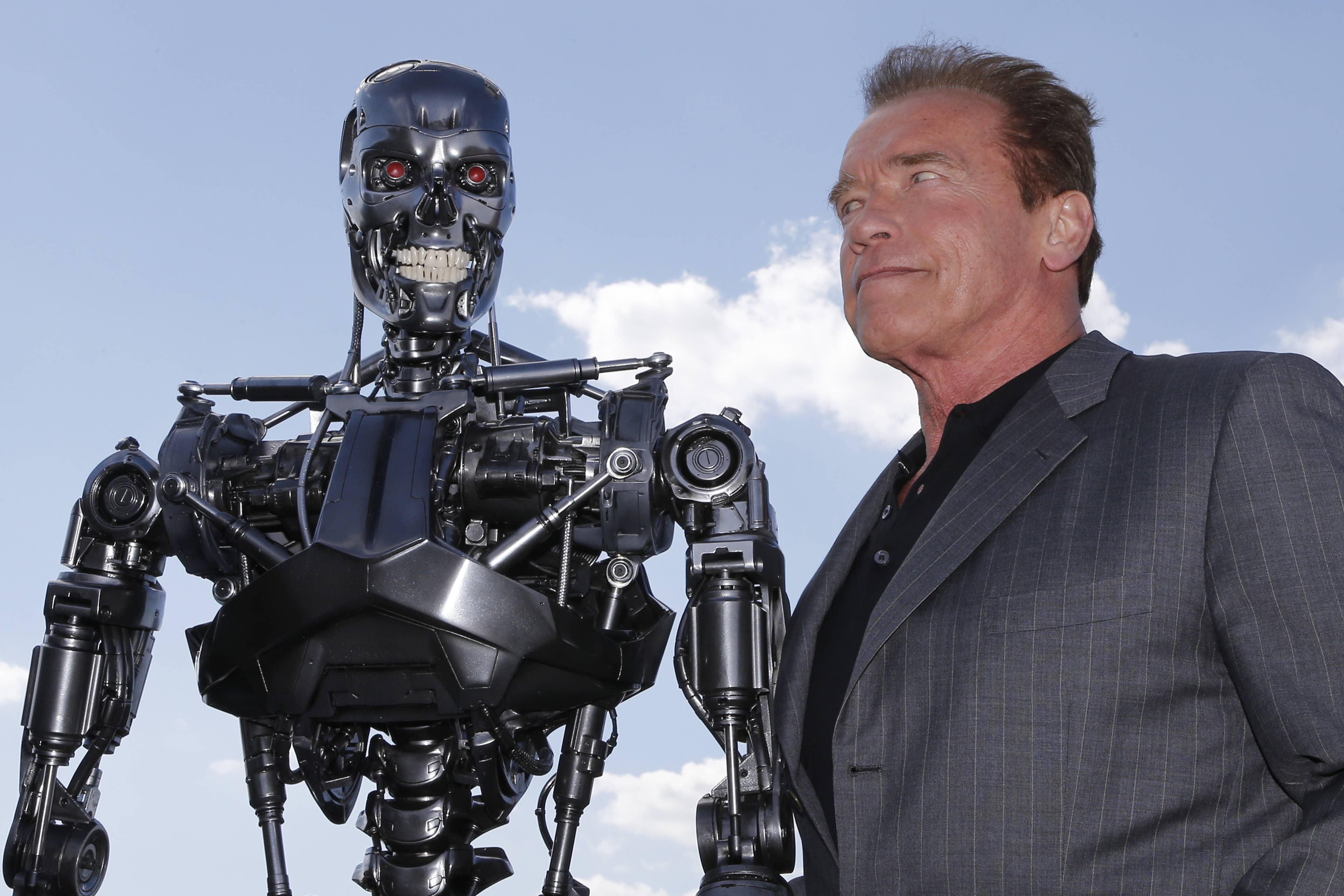 Arnold Schwarzenegger training with machines at the gym