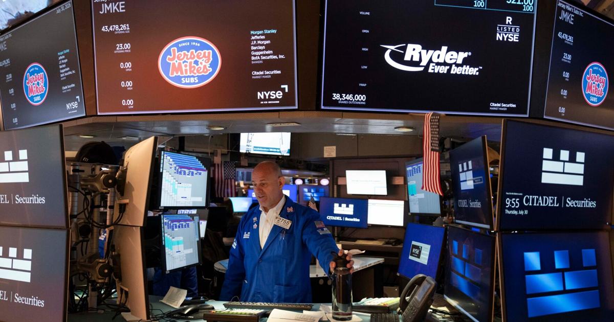 US stocks swing as Amazon leaps, Apple sinks and rising oil prices add to worries about inflation
