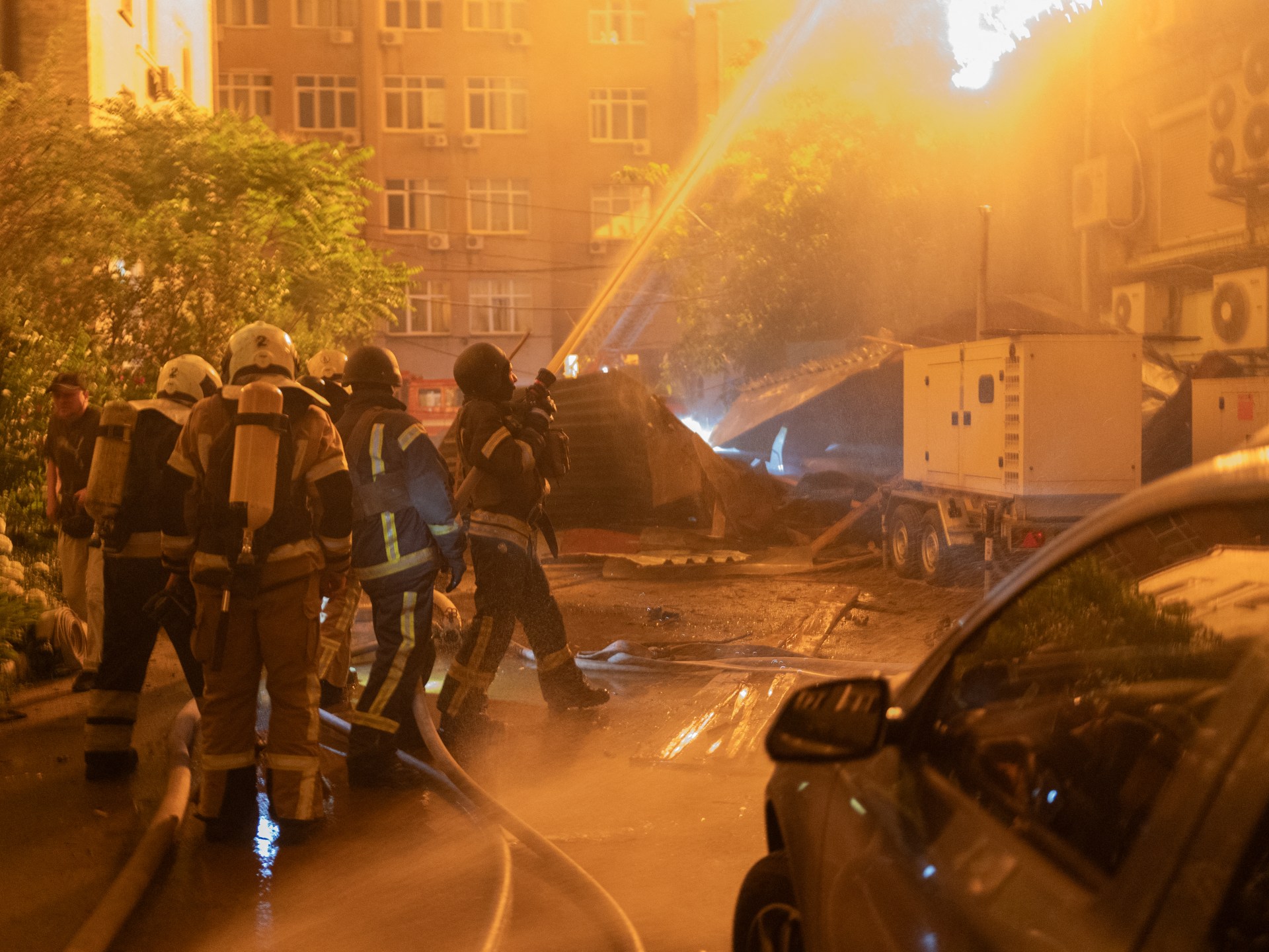 Russian attack kills at least 13, injures scores and causes damage across Ukraine capital
