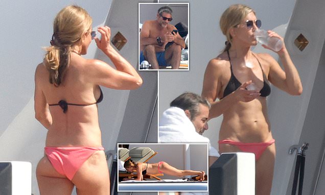 Bikini-clad Jennifer Aniston, 57, shows off toned abs with boyfriend Jim Curtis in Spain