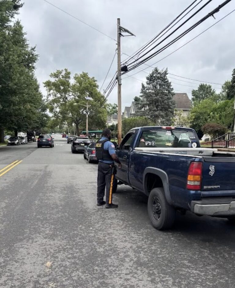 Dunellen Police Department officer in shrub costume during enforcement operation