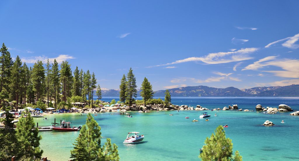 Lake Tahoe's Sand Harbor in daylight, showing the granite boulders and clear water