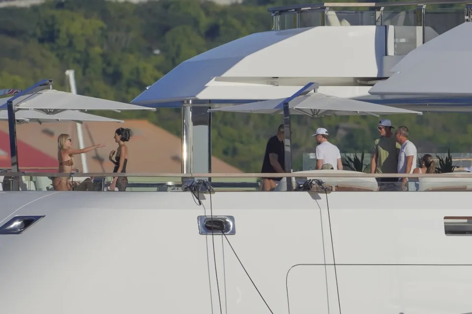 Tom Brady caught with his hand down his swimsuit during steamy yacht shower in France