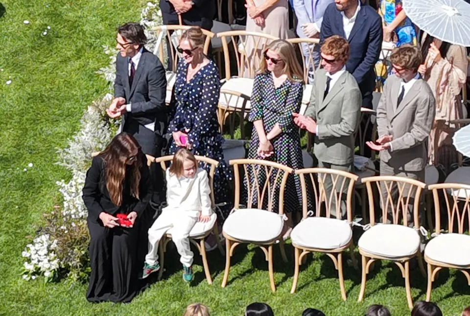 Emma Roberts in her custom Monique Lhuillier wedding dress at the ceremony.