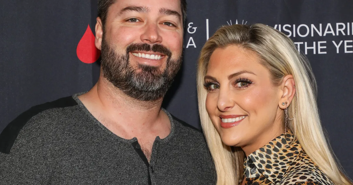 Gina Kirschenheiter and Travis Mullen with their engagement ring