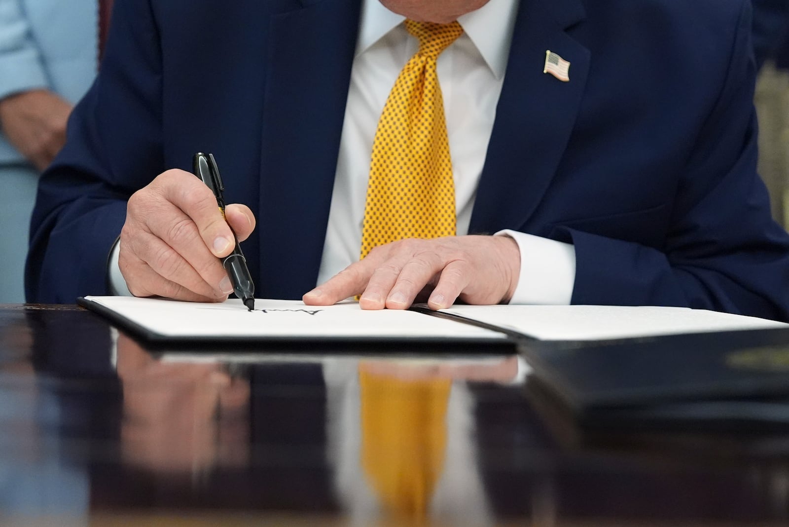 Jennifer Hegseth preparing to chair the military spouse commission at the White House signing