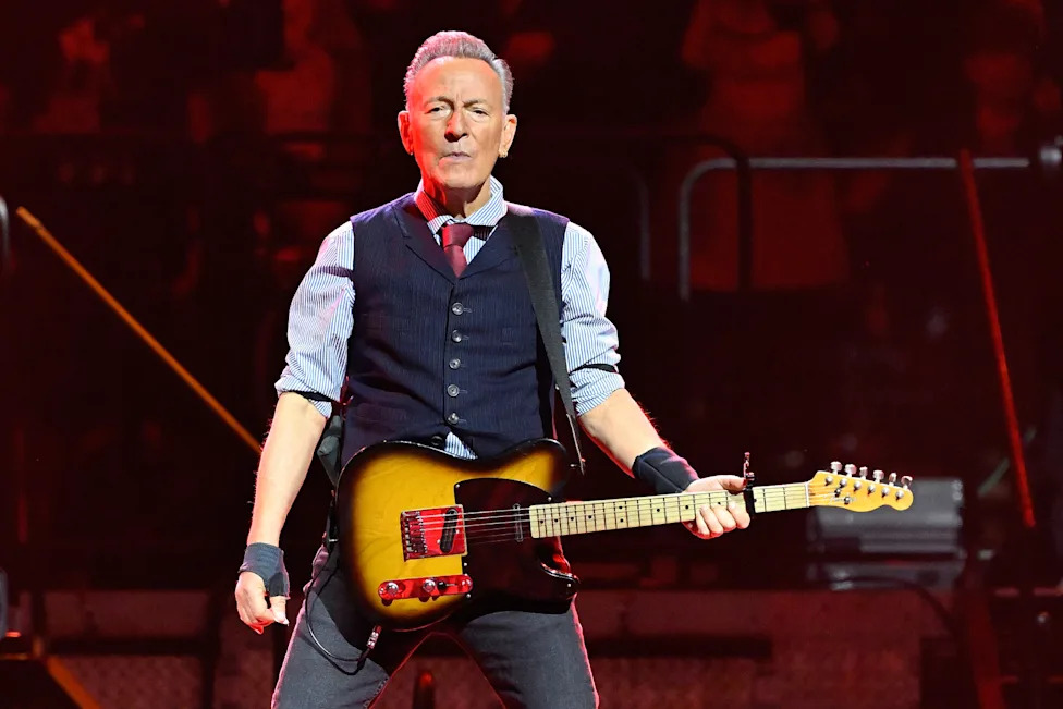Bruce Springsteen as a touring musician and husband to Patti Scialfa
