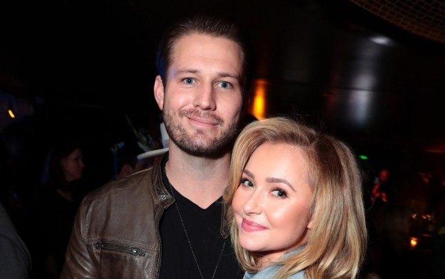 Injured Hayden Panettiere was taken out of LA apartment on gurney twice while living with Brian Hickerson, neighbor claims