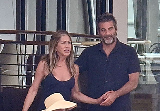Bikini-clad Jennifer Aniston and boyfriend Jim Curtis make out during yacht getaway