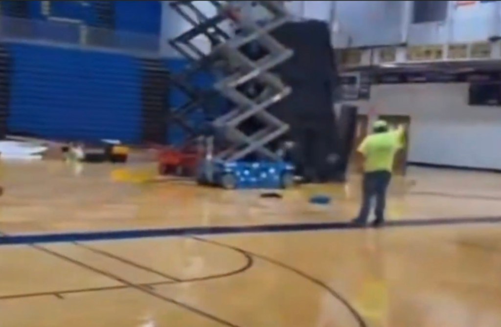 Extraordinary video shows failed jumbotron installation — shatters into pieces as it slams on gym floor