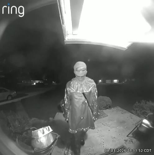 Ring doorbell footage capturing the clown-costumed suspect