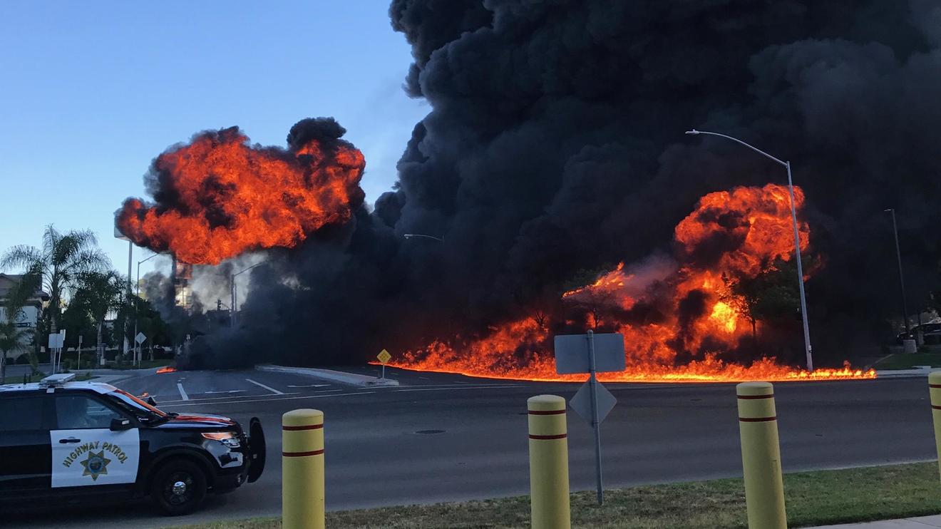Massive explosion on California highway as tanker carrying 8,600 gallons of gas erupts into flames