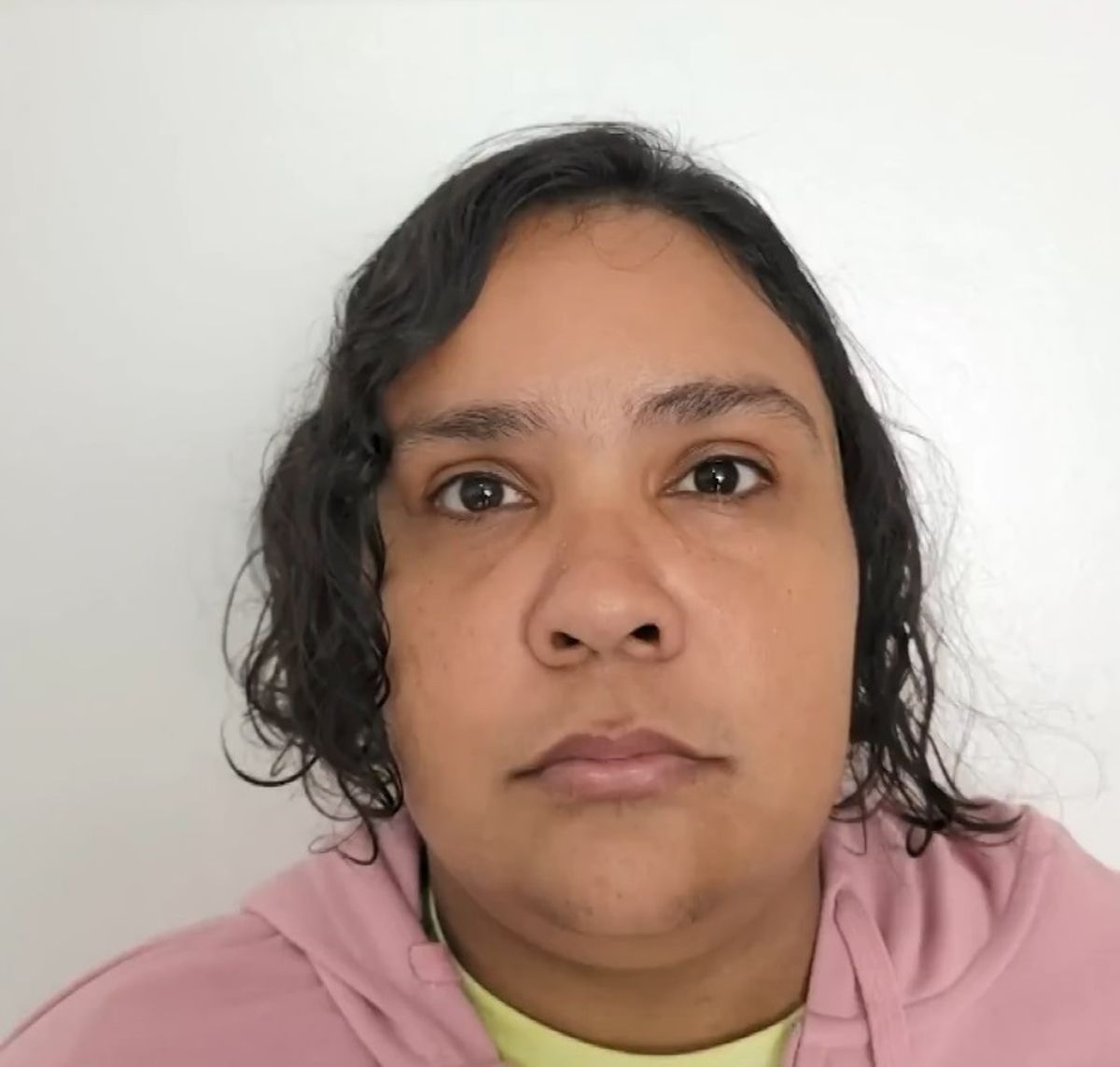 Woman who posed as 12-year-old girl and was adopted by family is jailed