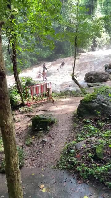 Harrowing video shows selfie-taking tourists being washed away near Thailand hotspot