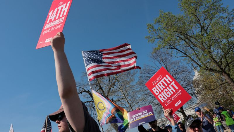 Trump, signing executive orders on immigration policy.