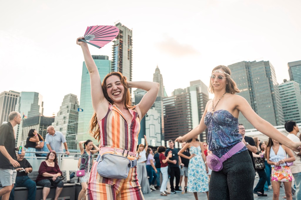 Thousands of jumpsuit-clad partiers boogie to 1970s hits at annual Gimme Gimme party: ‘I just keep coming back’