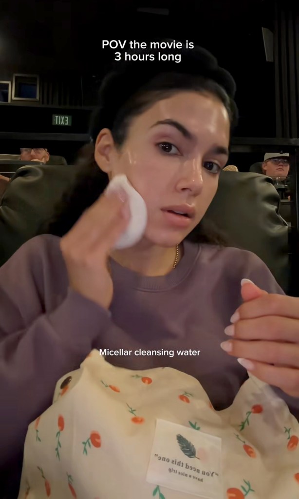 Clueless influencer sparks outrage filming skincare routine during lengthy movie: ‘So insanely rude’