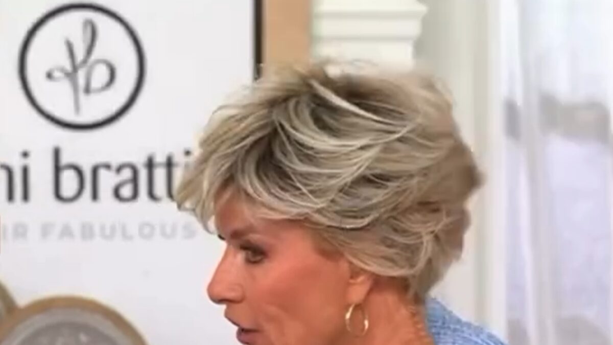 Toni Brattin, wig entrepreneur and QVC guest host, demonstrating hairpieces during the live broadcast