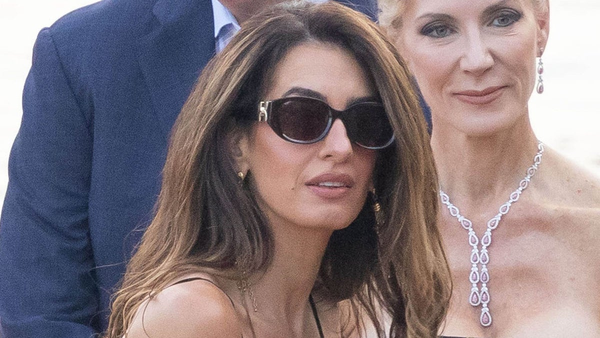 George and Amal Clooney step out with rarely seen twins, Ella and Alexander, at charity event