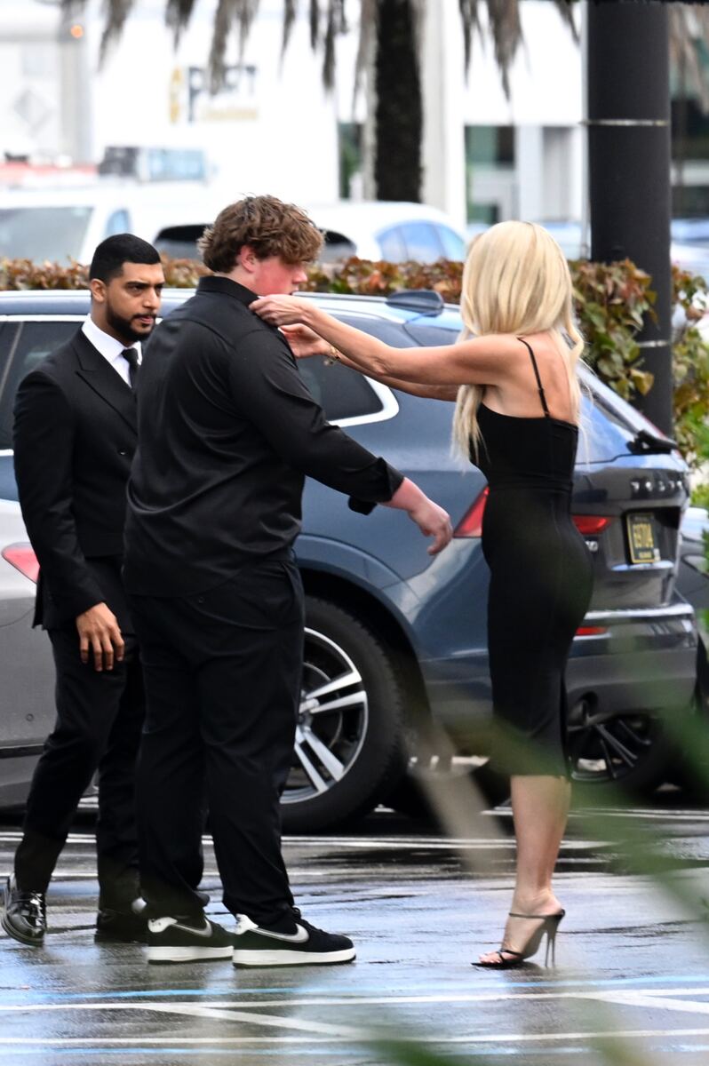 Kim Zolciak steps out for Palm Beach dinner as son KJ remains behind bars on sexual assault charges