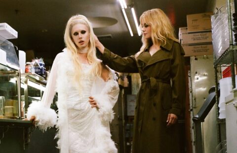 Nicole Kidman cozies up to young pop star, smokes cigarette and downs shot in raunchy music video