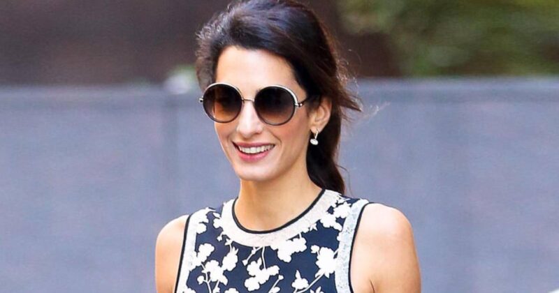 George and Amal Clooney step out with rarely seen twins, Ella and Alexander, at charity event