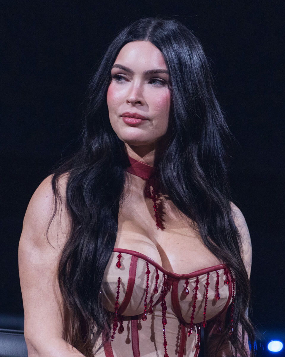 Megan Fox shows some skin in latex bandeau and leather chaps