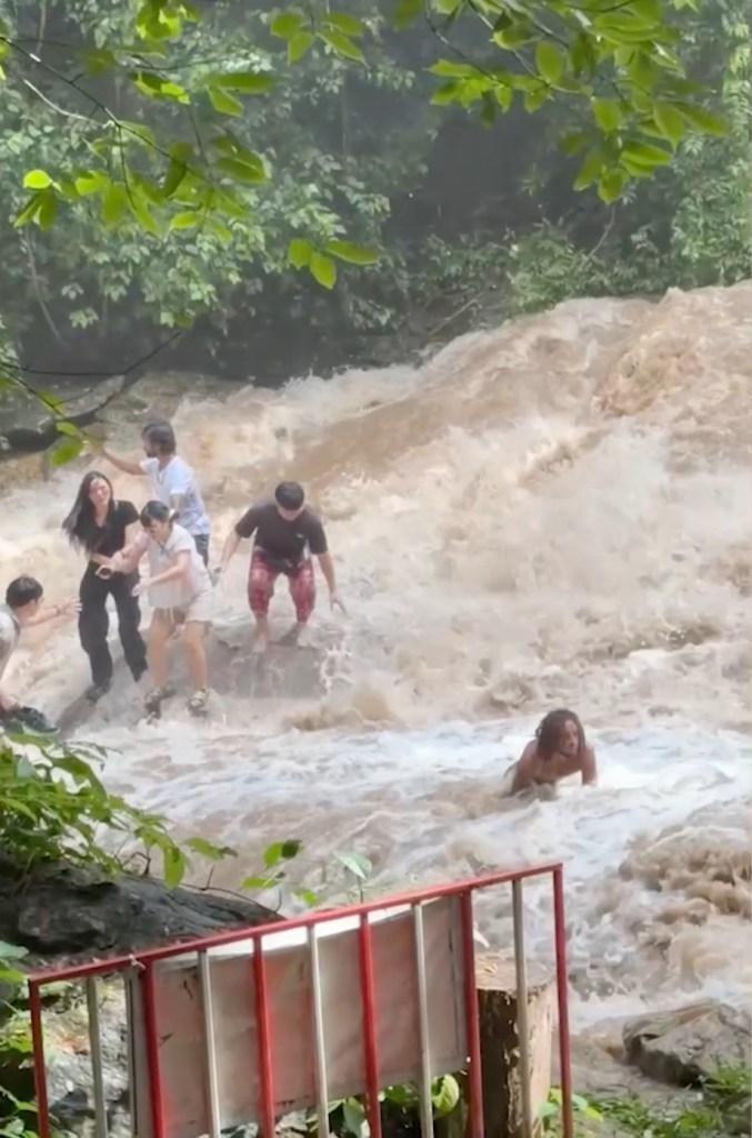 Harrowing video shows selfie-taking tourists being washed away near Thailand hotspot