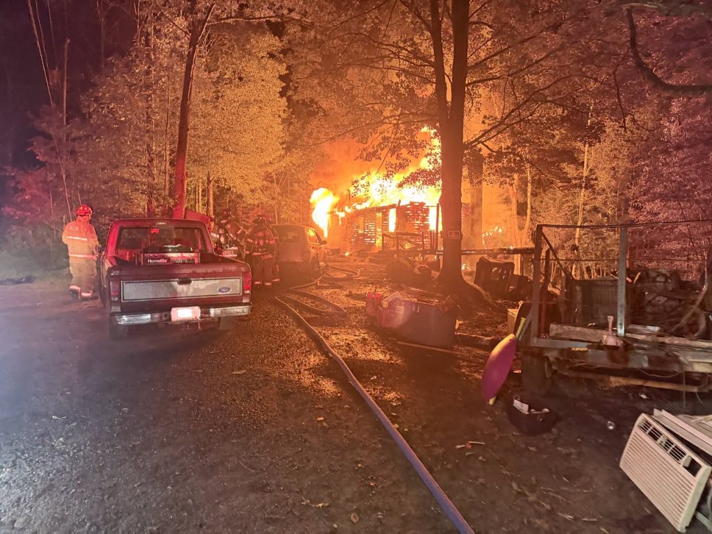 New Hampshire man allegedly steals rescue truck from firefighters battling his burning home
