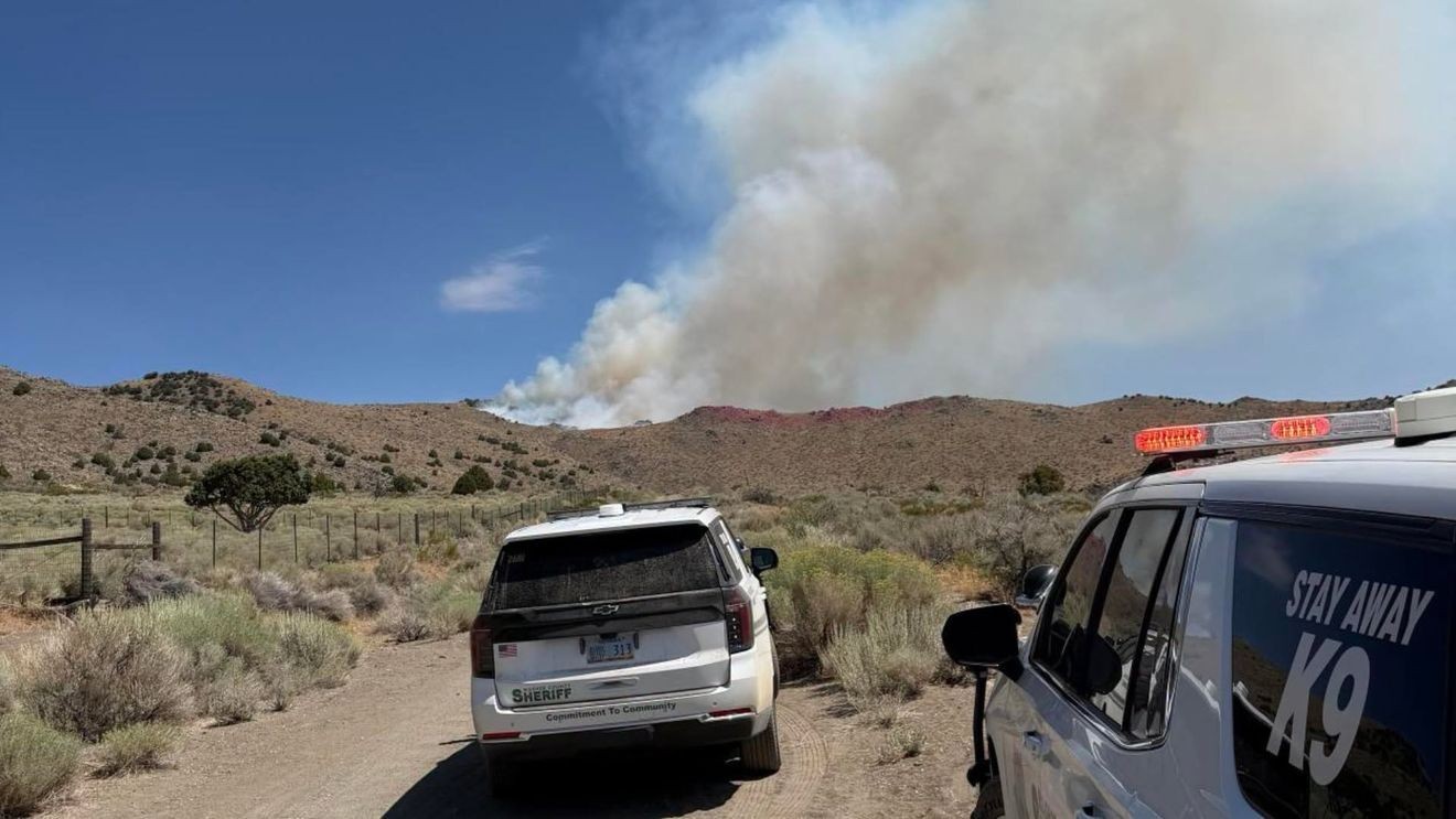 Two massive wildfires converge to rip across 44,000 acres on California-Nevada border as evacuations underway