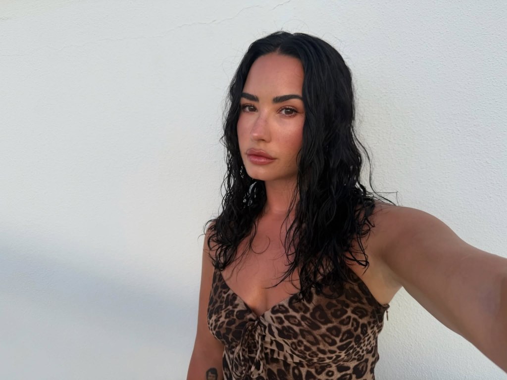 Demi Lovato heats up the Bahamas in a red string bikini for her 34th birthday