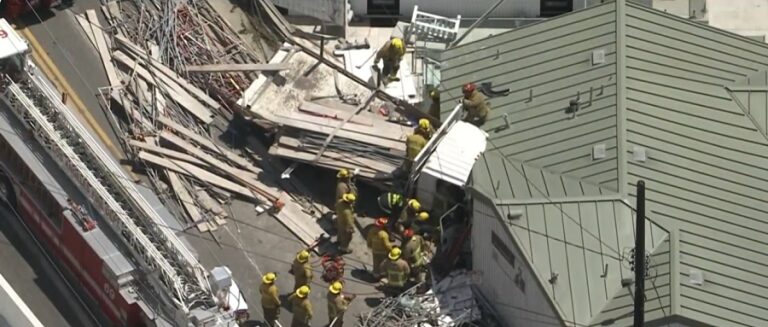 LAFD personnel deployed to the multi-building structure during rescue efforts