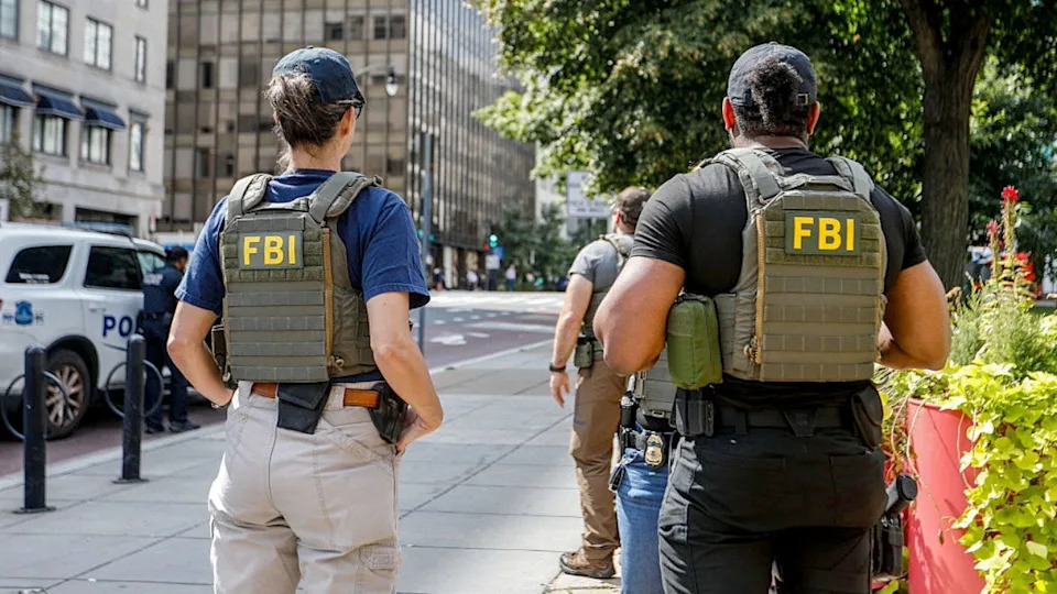Officers of MPD's Violent Crime Suppression Division at the scene of the arrest