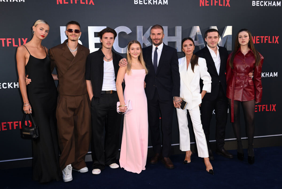 Brooklyn Beckham shares intimate bed snaps with Nicola Peltz as dad David plays happy family amid feud