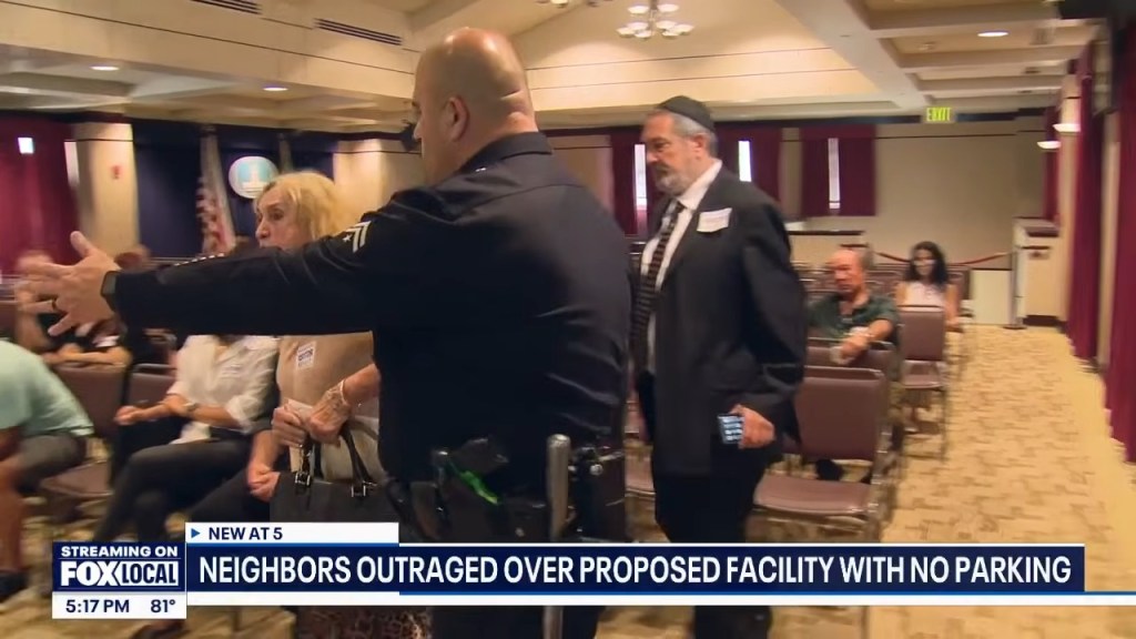 Ritzy LA neighborhood descends into bizarre shouting match over old people’s home plans: ‘He’s just a perv’
