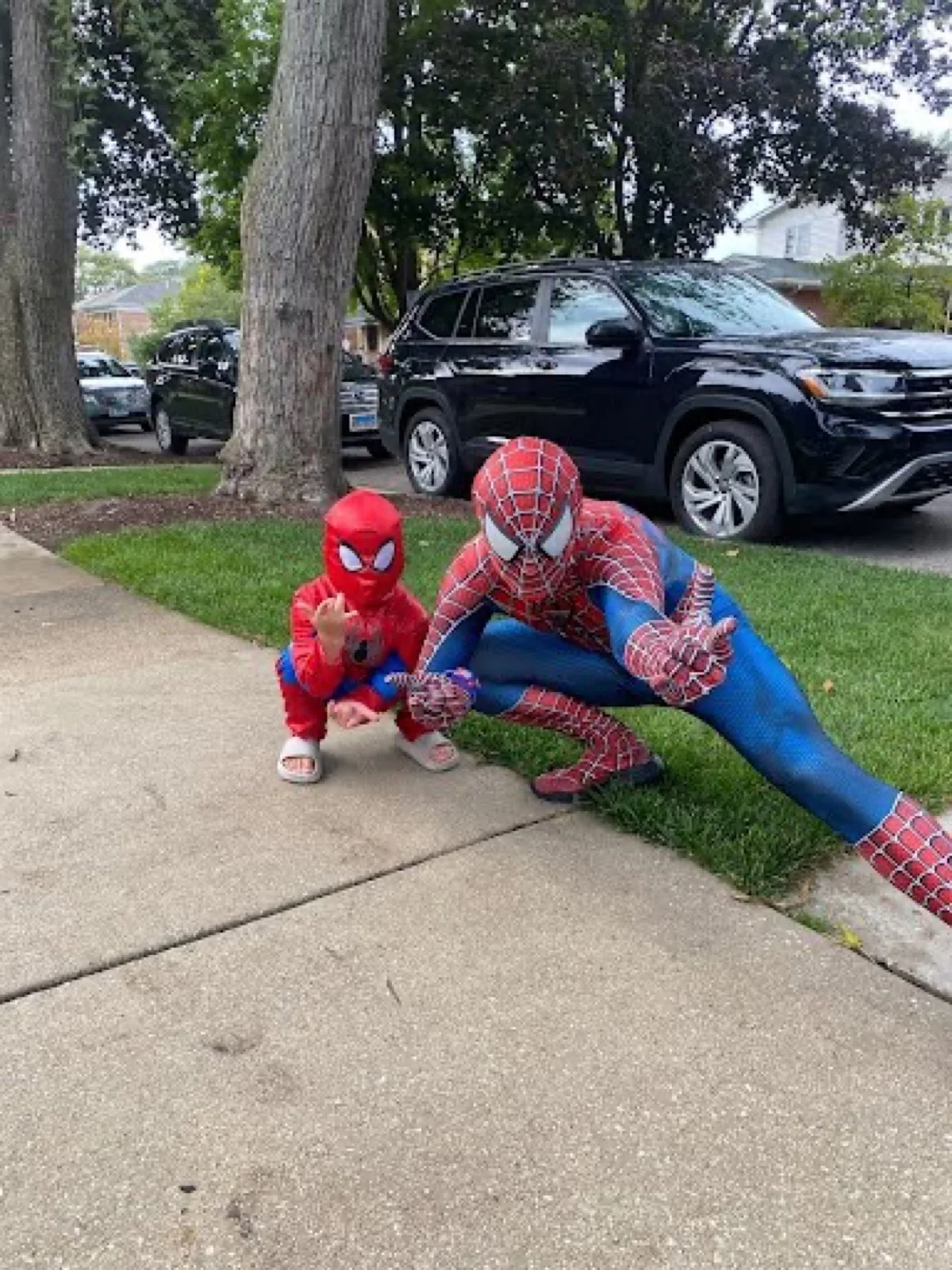 Angelenos line up to lock lips with Spider-Man impersonators outside luxury grocery store