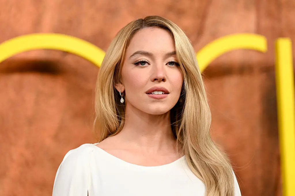 Sydney Sweeney takes swipe at Tom Cruise as she hangs from plane in new stunt