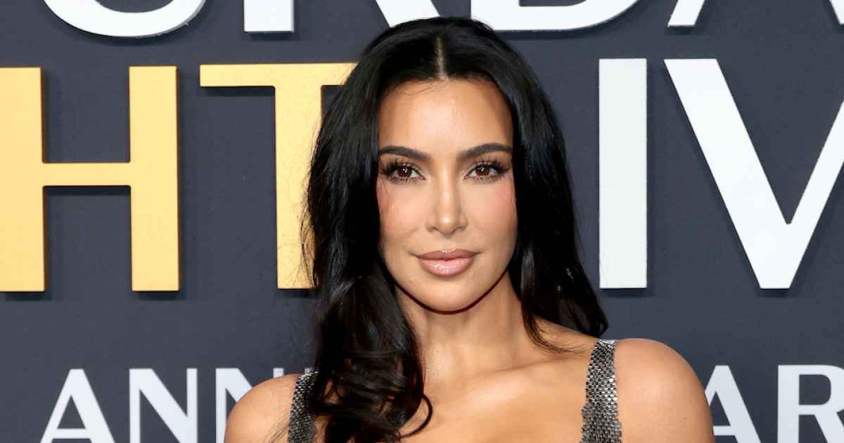 Kim Kardashian surfs in Gucci bikini on vacation with Lewis Hamilton and family