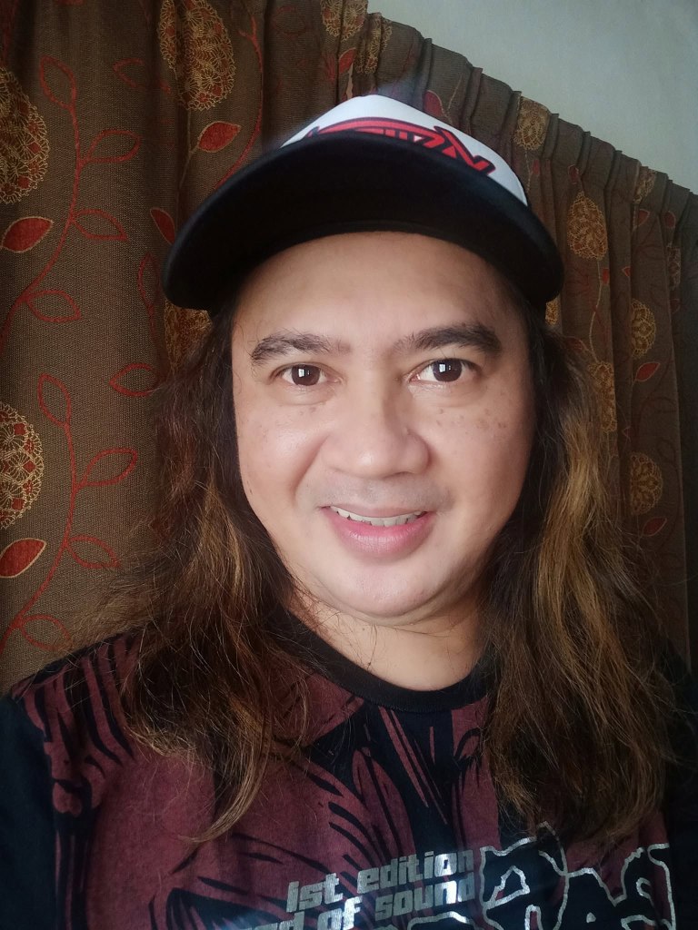 Malaysian rock drummer dies onstage mid-performance after collapsing over his drum kit