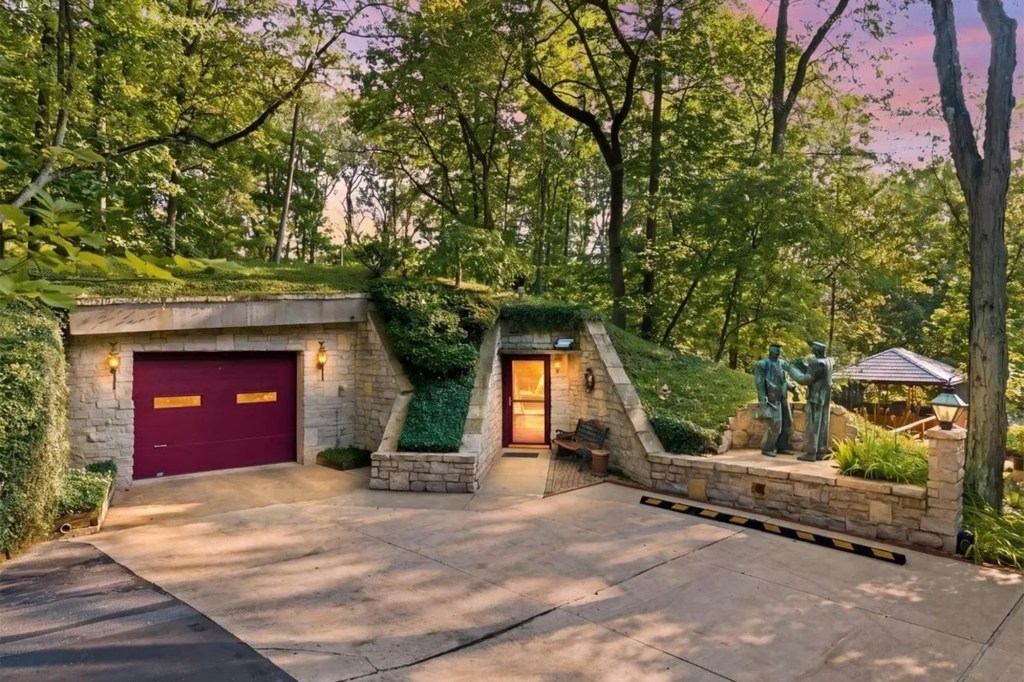 Earth-sheltered Ohio home that is built almost entirely underground comes with a roof you have to mow