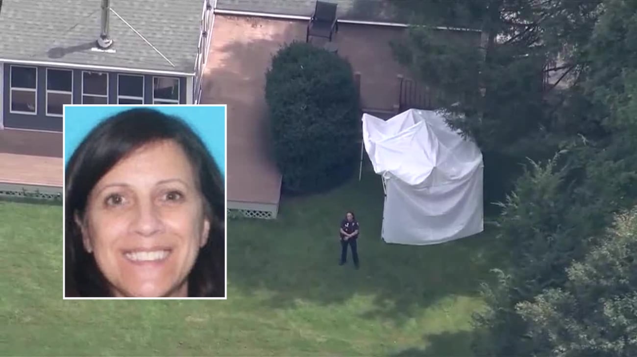 ‘Presumed armed and dangerous’ wife of dead cop seen calmly walking from death scene — as her surprising background emerges