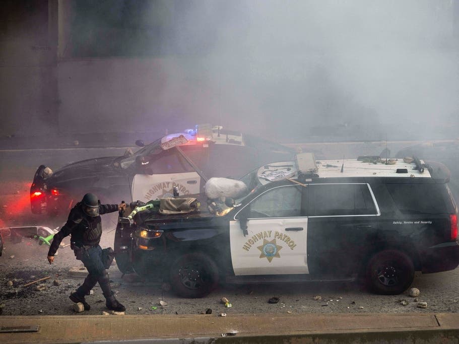 Illegal migrant who sprayed lighter fluid on burning cop car in wild anti-ICE riot learns fate