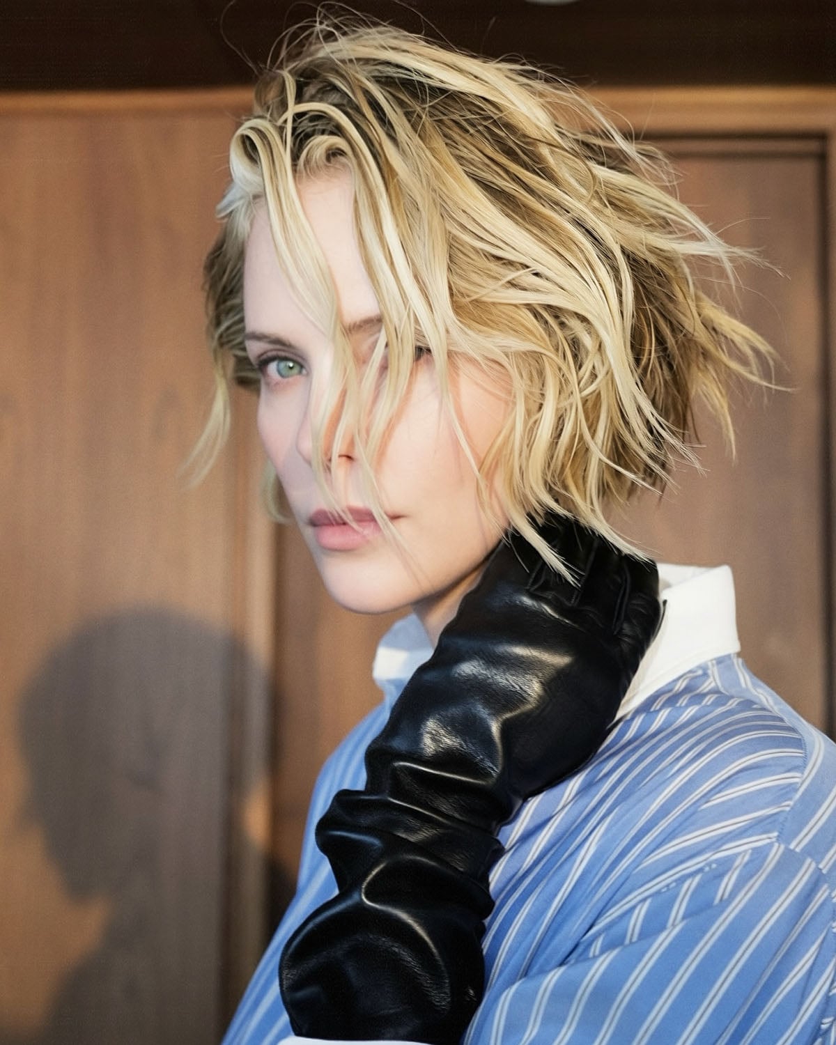 Charlize Theron sports see-through plastic skirt for ‘The Odyssey’ press stop in Seoul