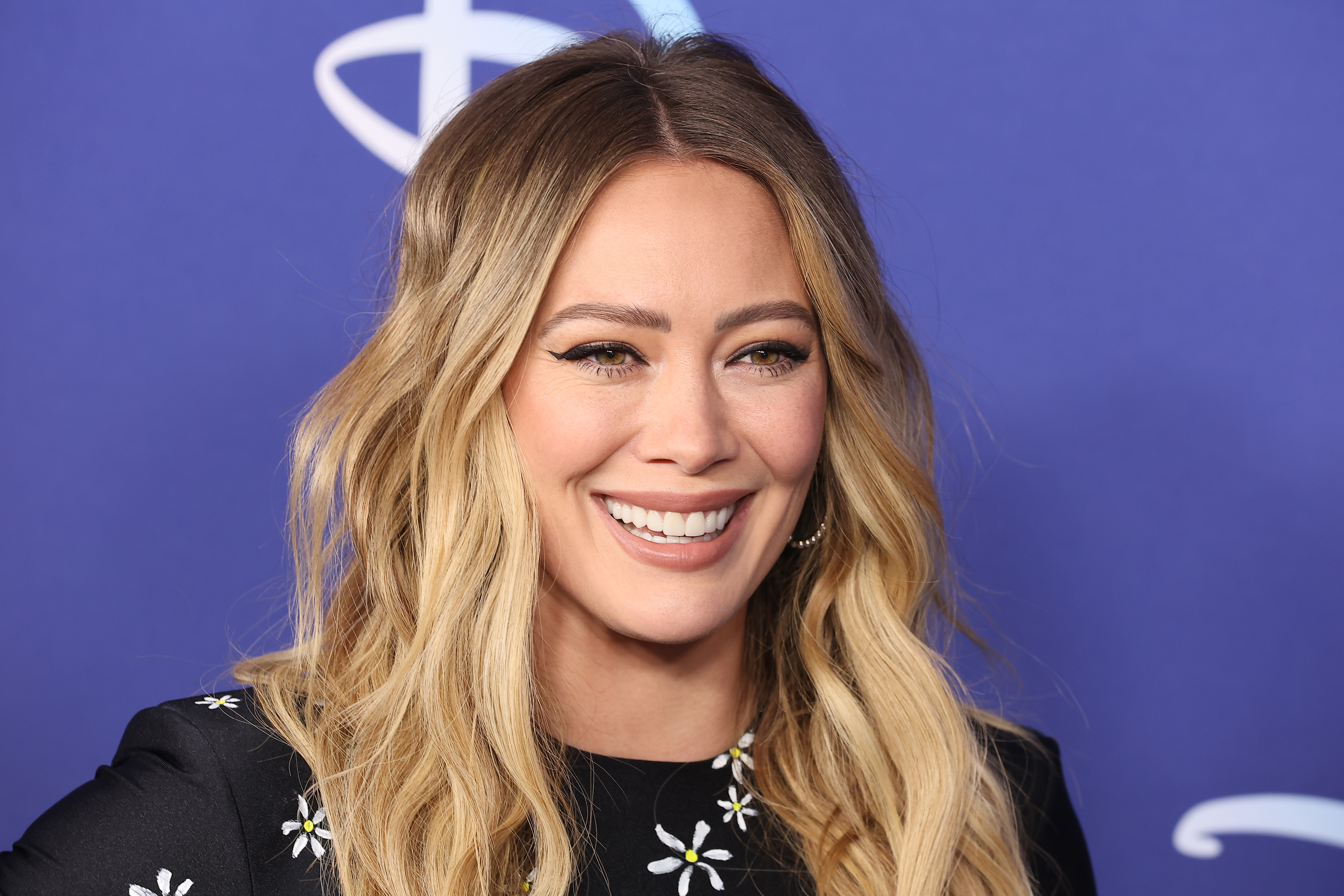 Hilary Duff reunites with ex Joel Madden for surprise duet 20 years after split