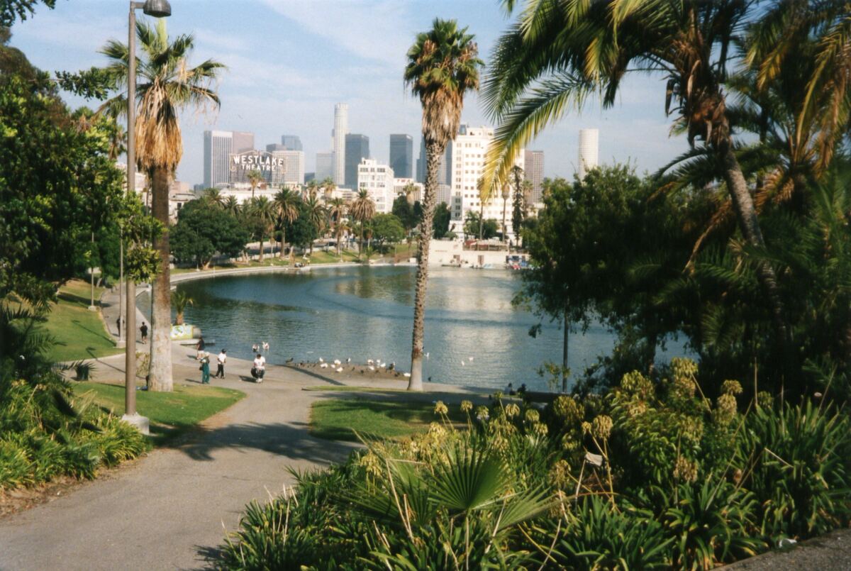 Moment crazed half-naked woman dragged from notorious LA lake by cops