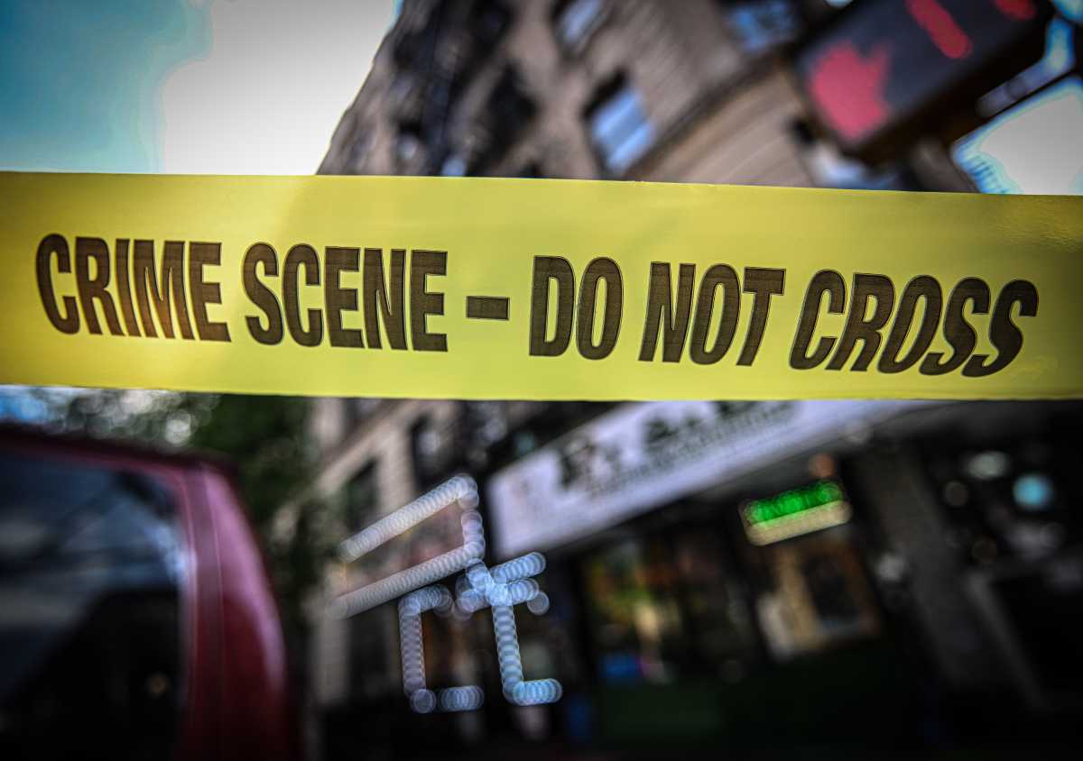 Police tape at the apartment building on Prospect Avenue